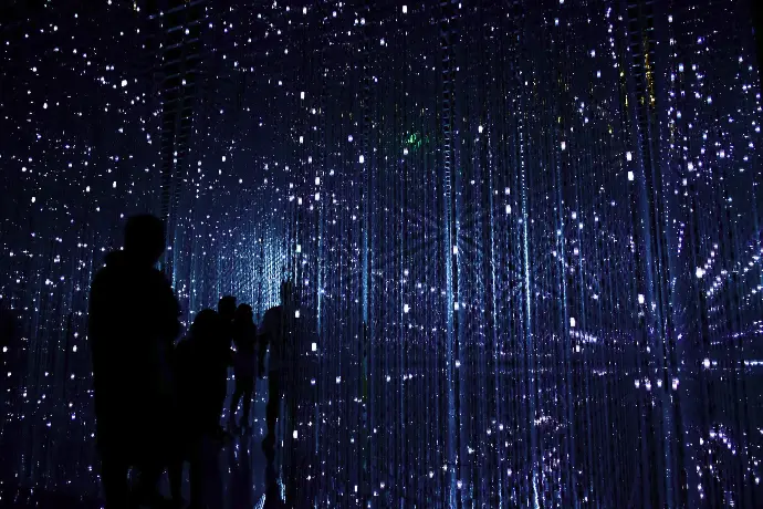 a group of people standing next to each other